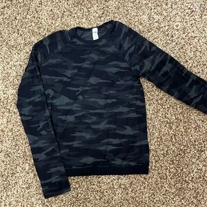 Black camo size medium athleta girl long sleeved tight fitting shirt.